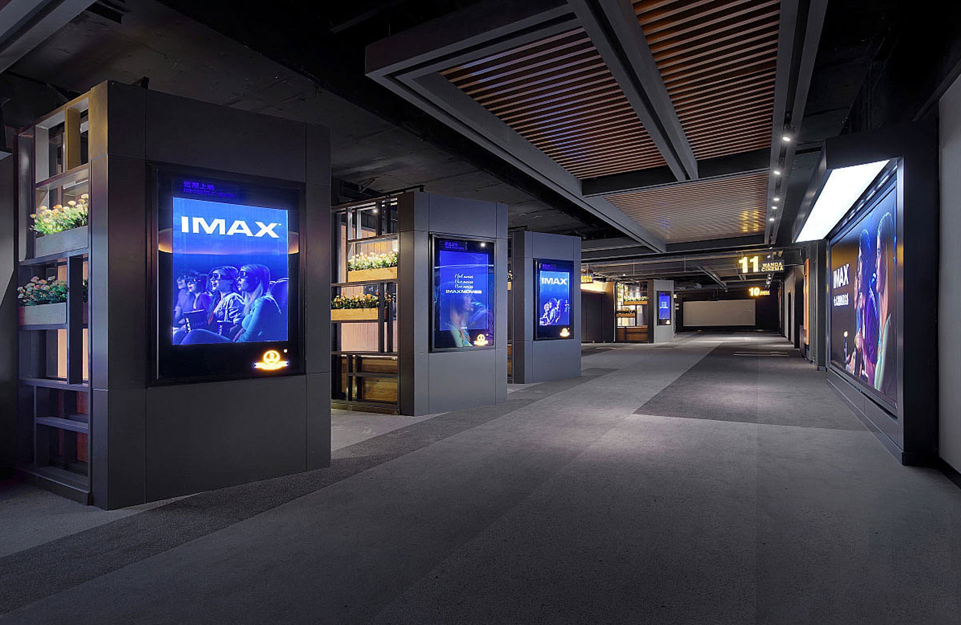 China cinema lightbox advertising along corridors reinforces brand messaging before the film begins